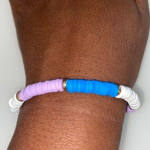 light purple white and dark blue bracelet